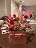 Pink purse dried floral arrangement