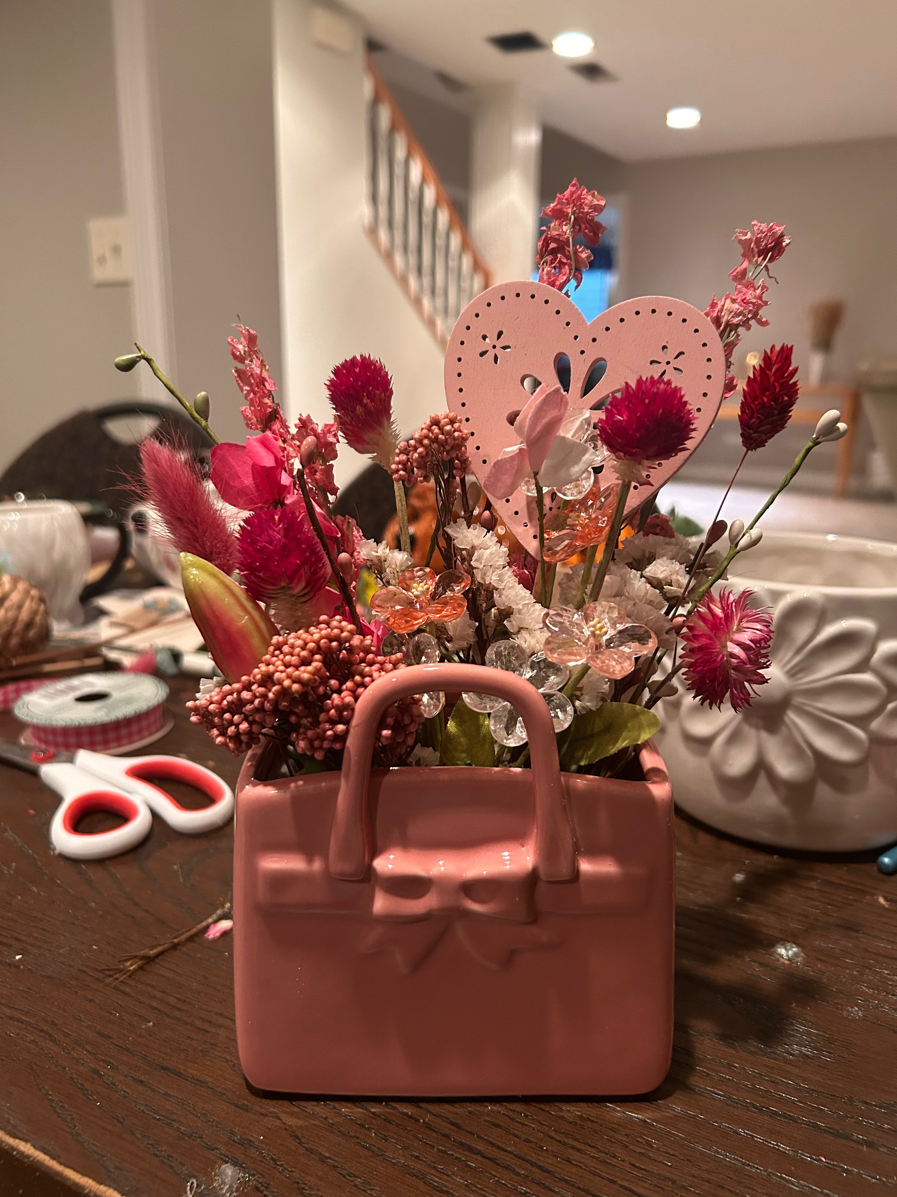 Pink purse dried floral arrangement
