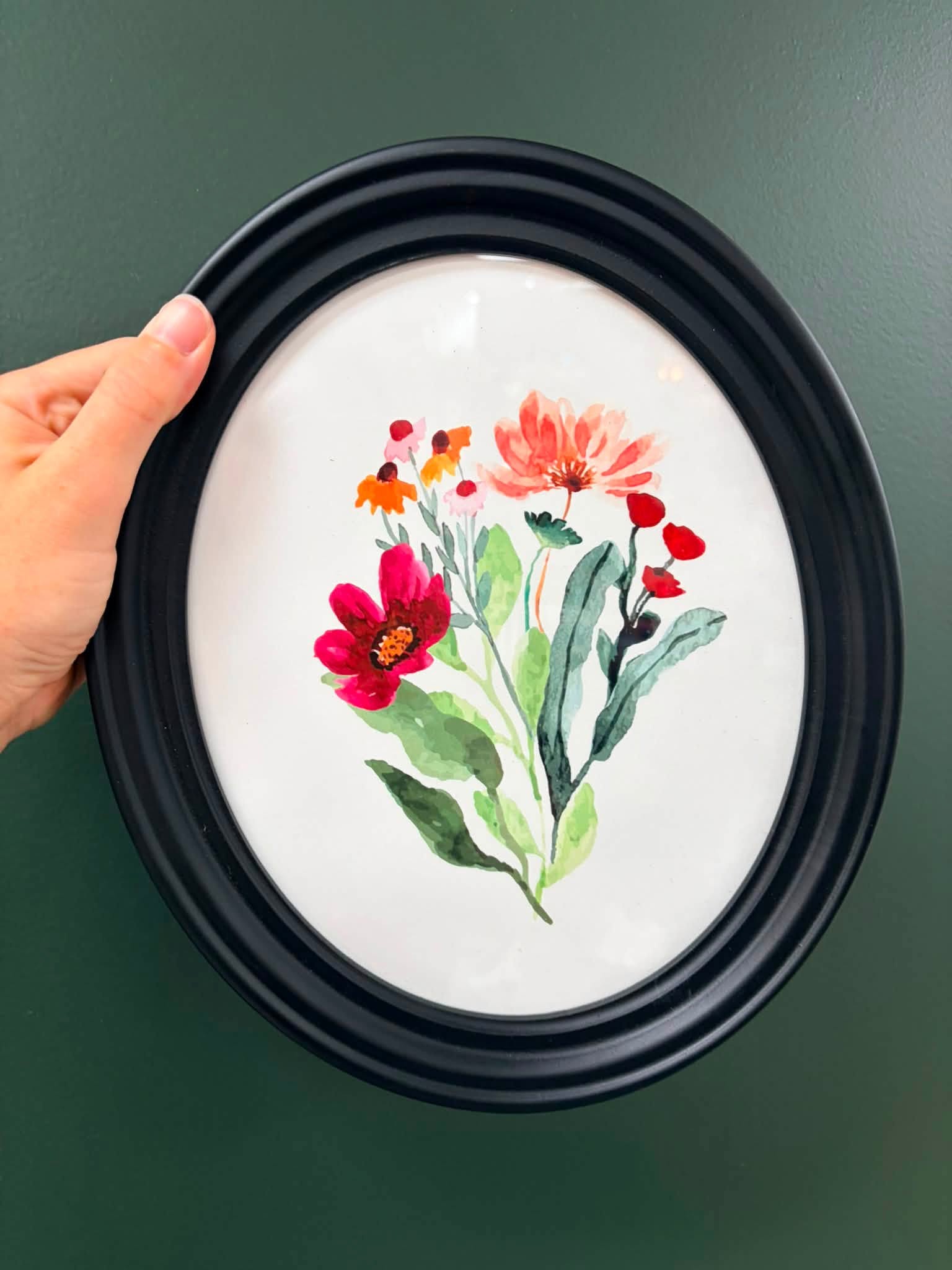 Watercolor Red/Orange flowers in Black Oval frame