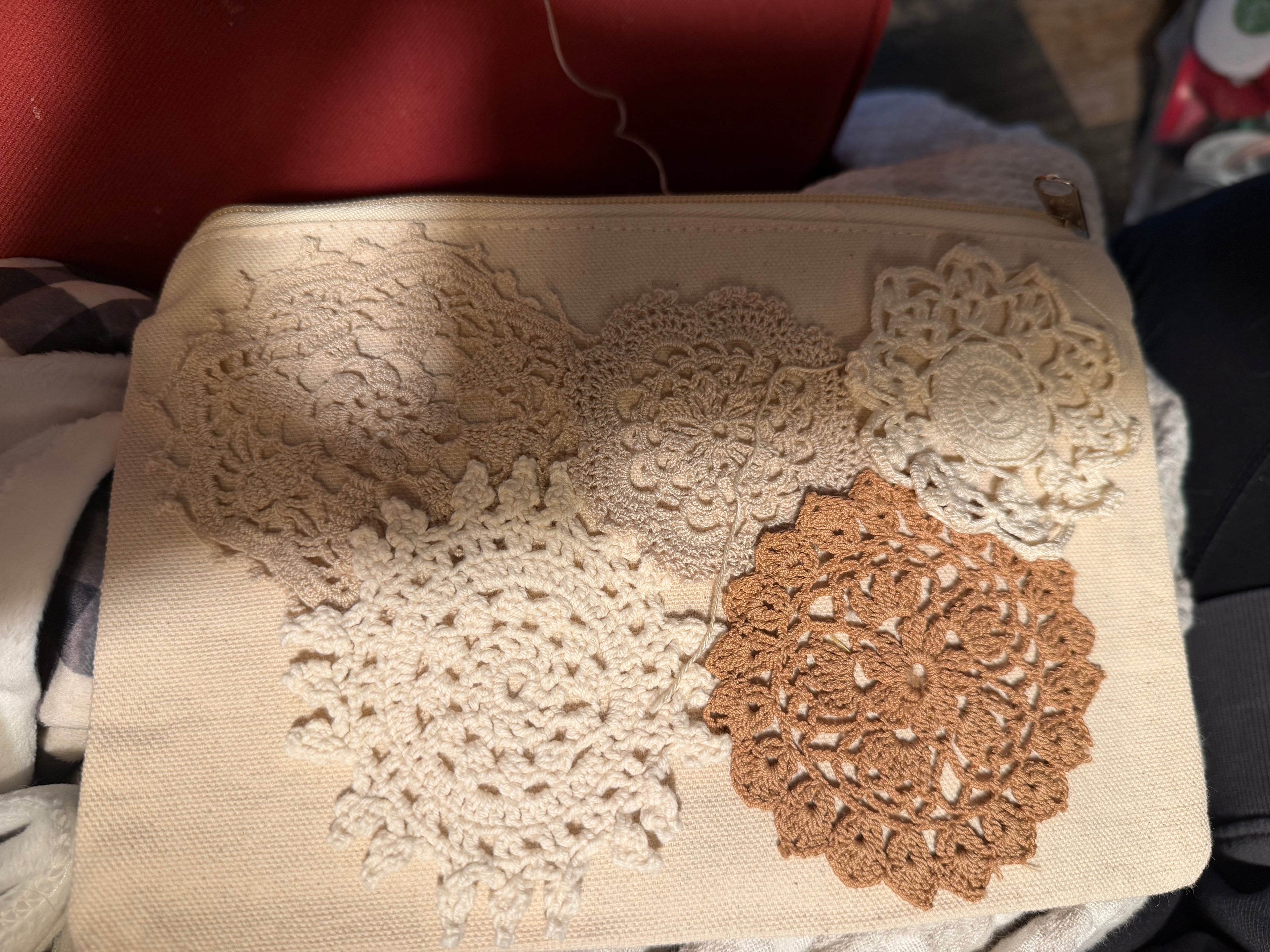 Medium cosmetic bag with hand sewn doily decor