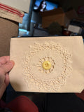 Medium cosmetic bag with hand sewn doilies black zipper