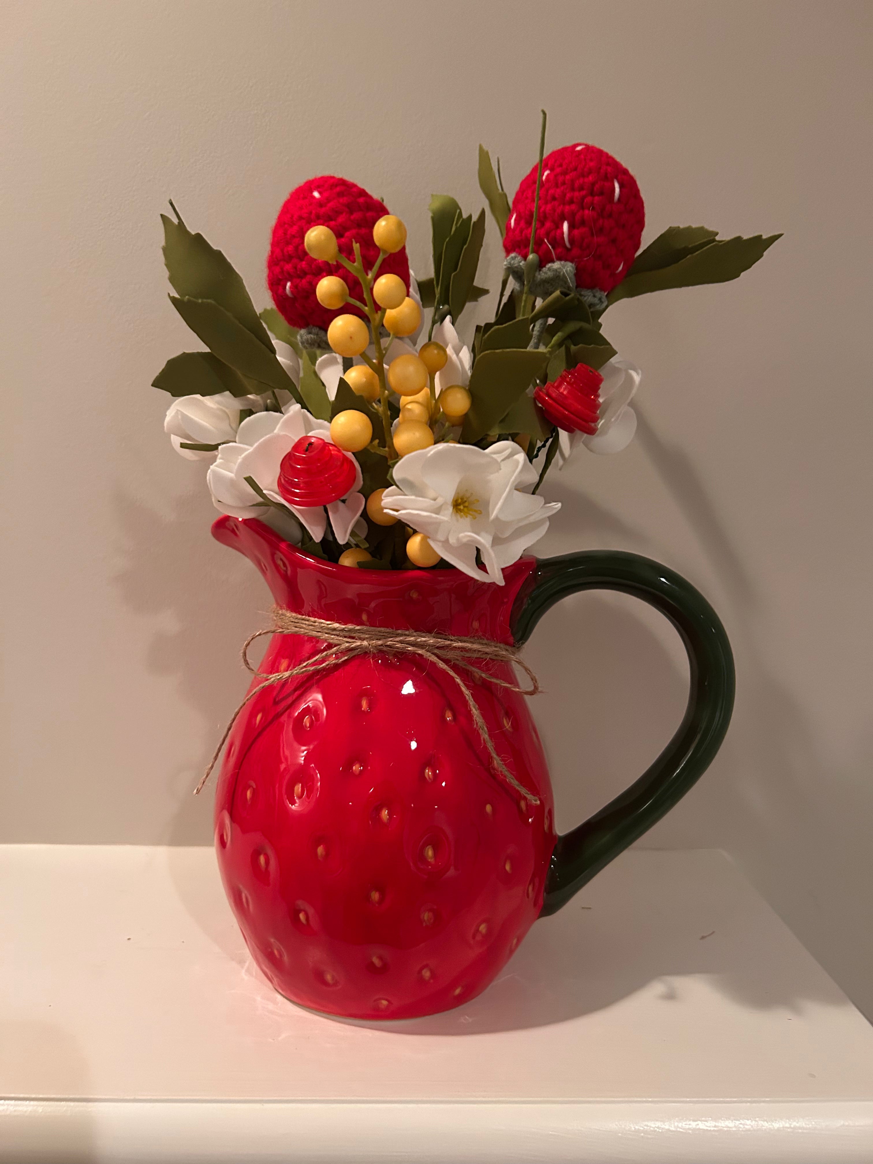 Strawberry pitcher arrangement with hand crocheted strawberries