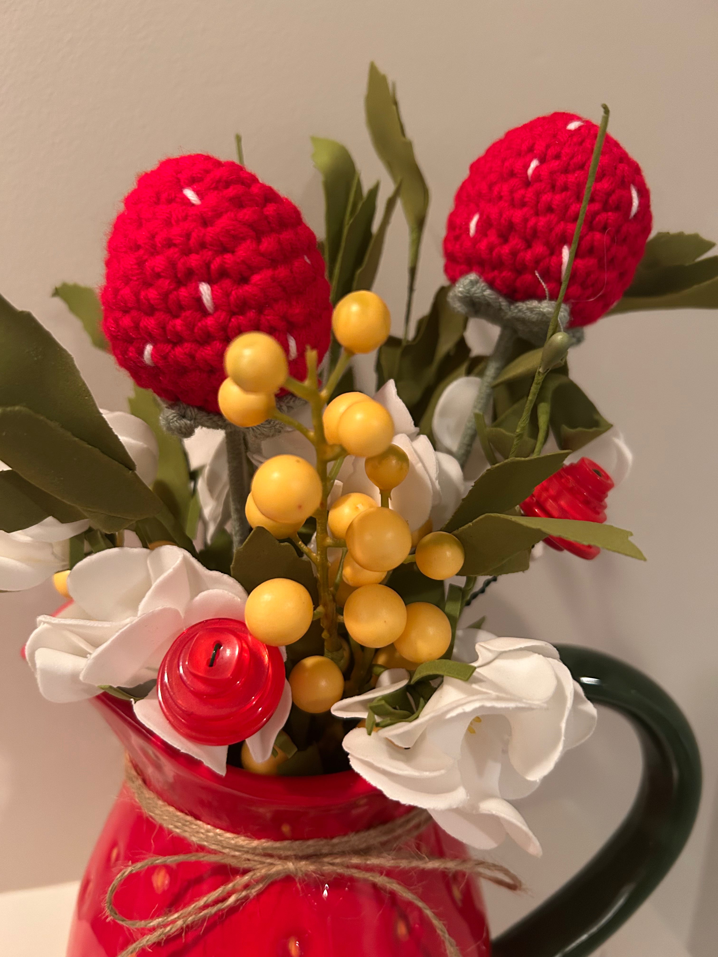 Strawberry pitcher arrangement with hand crocheted strawberries