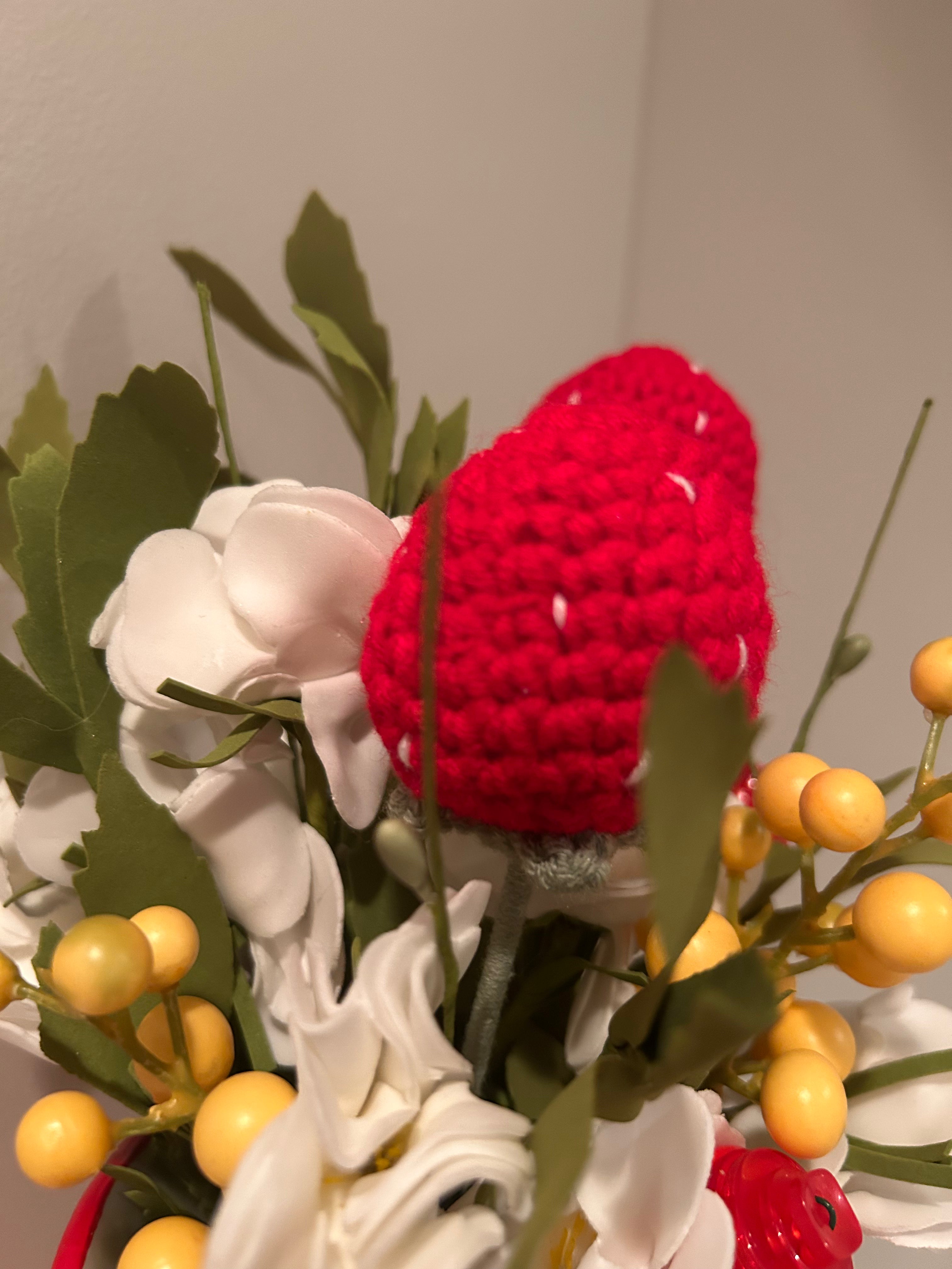 Strawberry pitcher arrangement with hand crocheted strawberries
