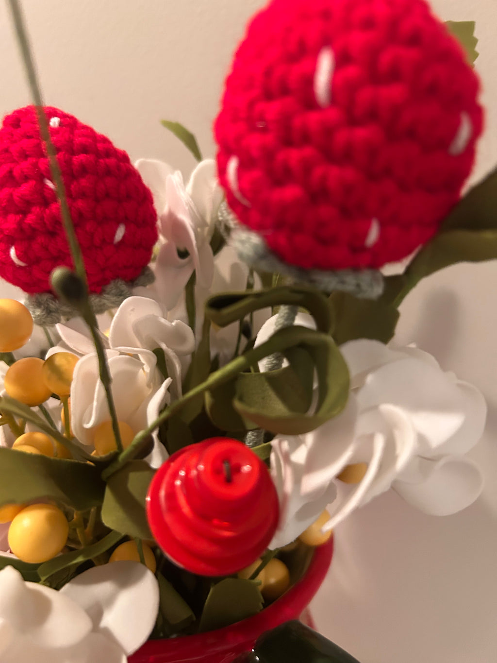 Strawberry pitcher arrangement with hand crocheted strawberries