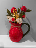 Strawberry pitcher arrangement with hand crocheted strawberries