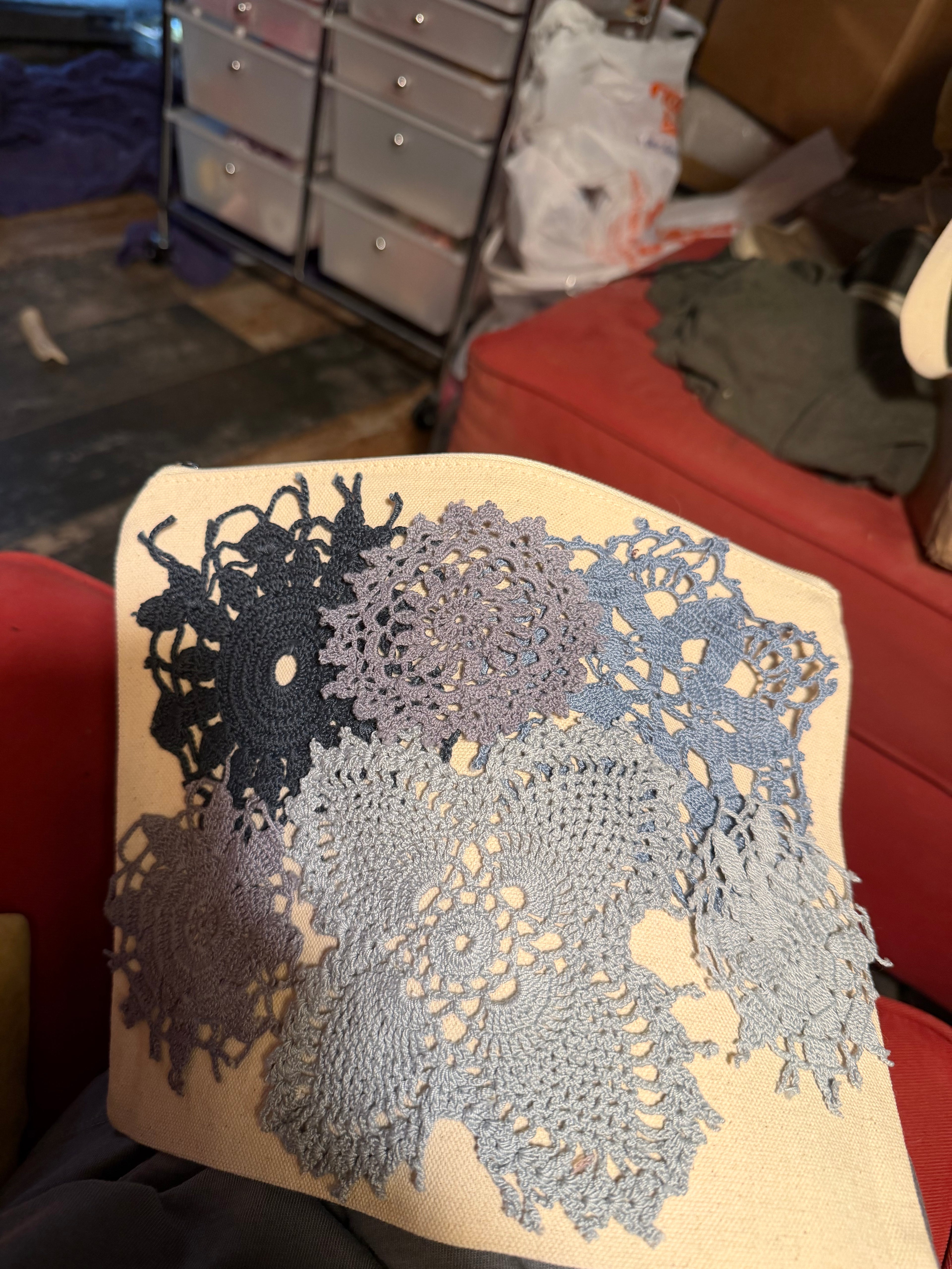 Large cosmetic bag with hand sewn doily decor