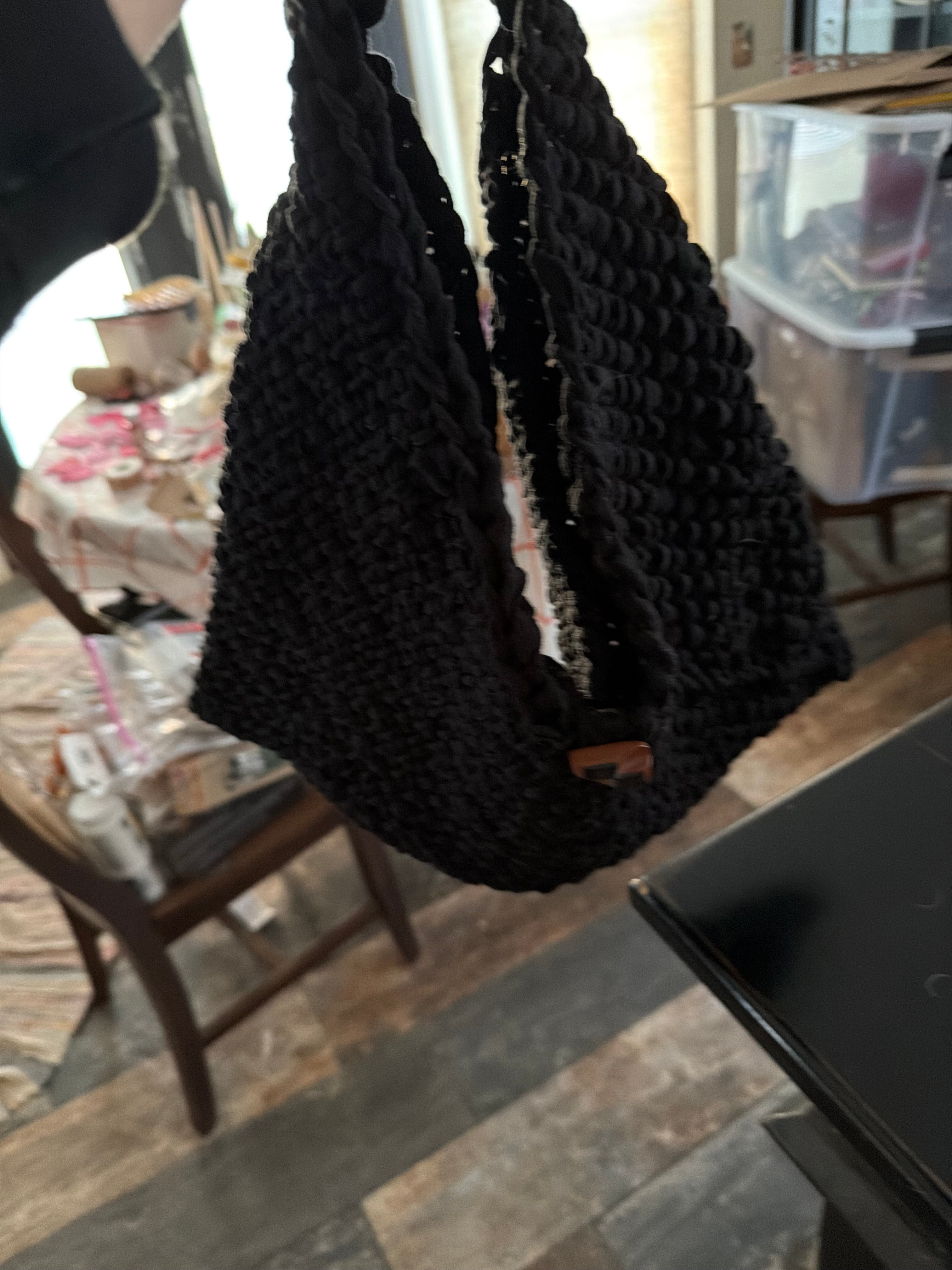Handmade knitted black purse with wooden handles