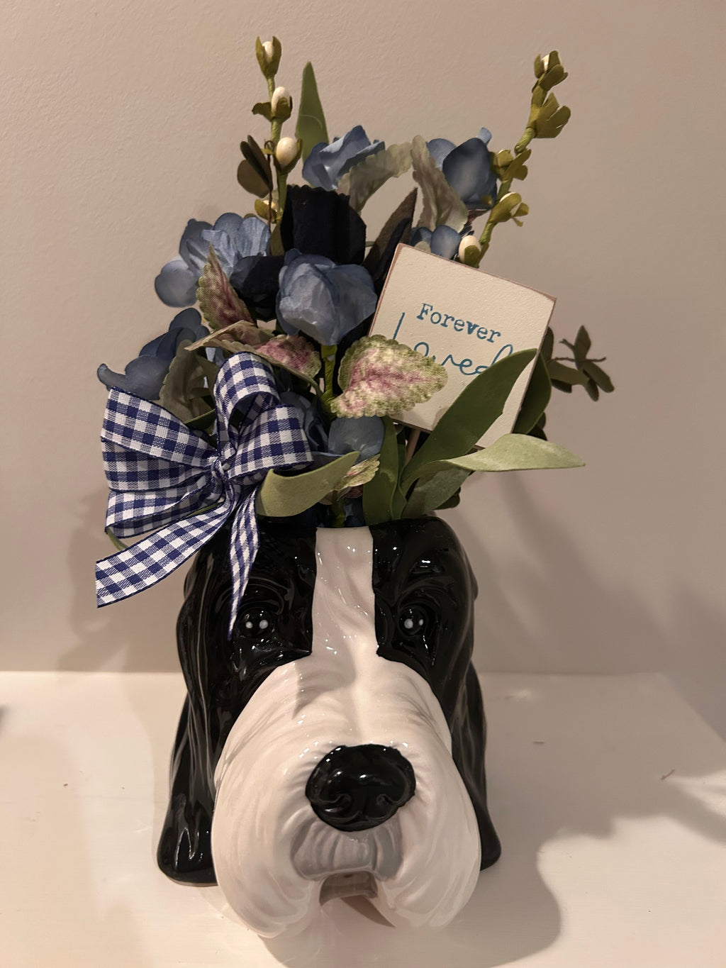 Ceramic English Sheepdog Planter with blue floral arrangement