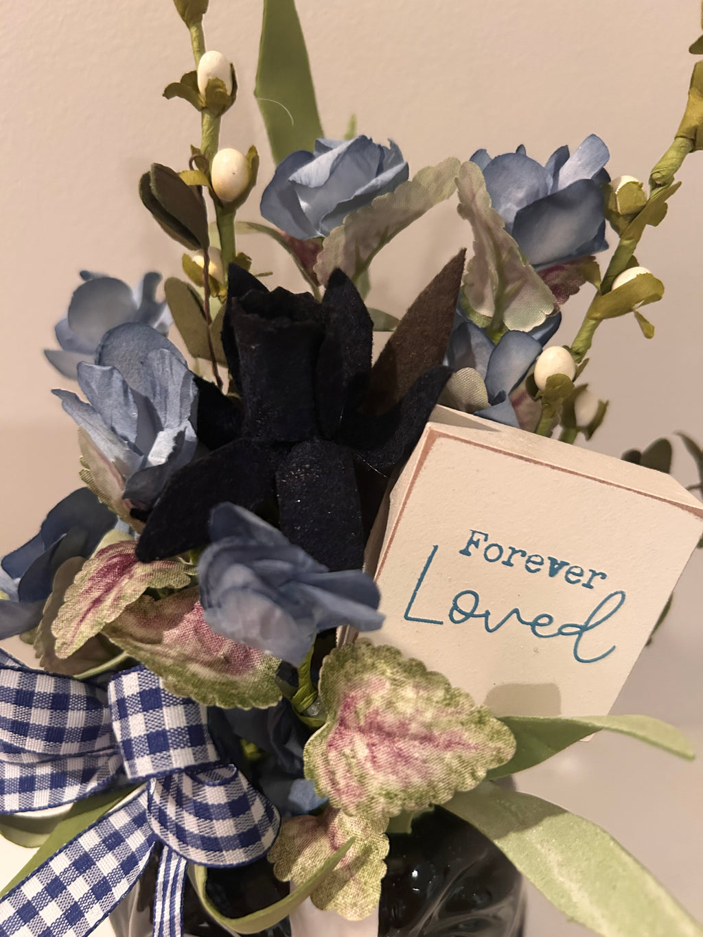 Ceramic English Sheepdog Planter with blue floral arrangement