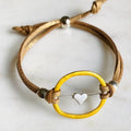 Heartfelt tan and gold bracelet