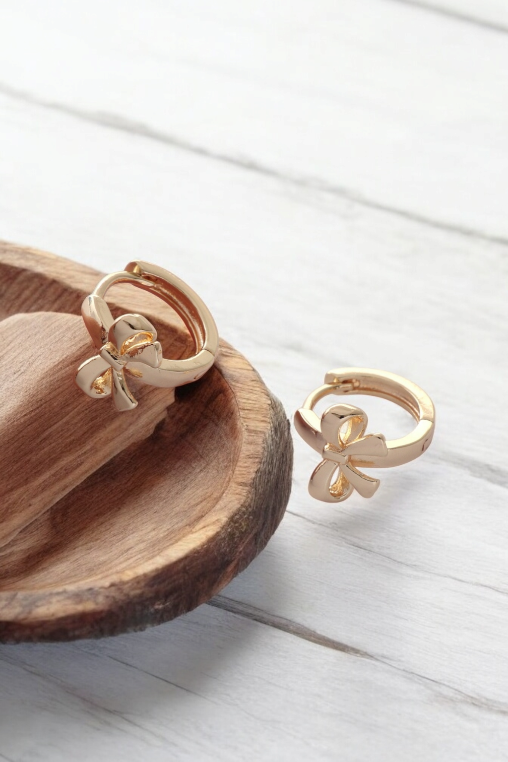 Bow huggie hoops